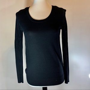 Long sleeve black top with fishnet sleeves
